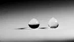 Drop freezing: fine detection of contaminants by measuring the tip angle
