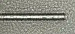 Roughness-induced friction in liquid foams